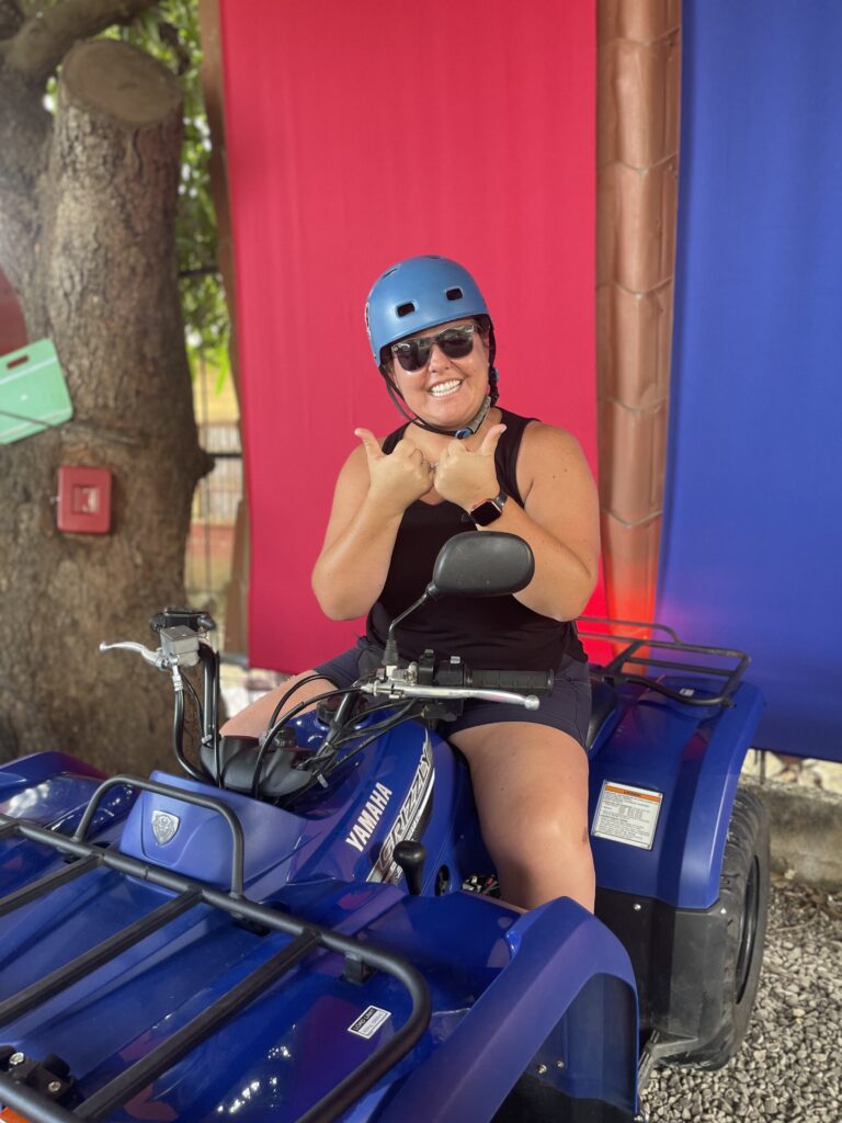 Smiling rider in helmet ready for an ATV tour in Guanacaste