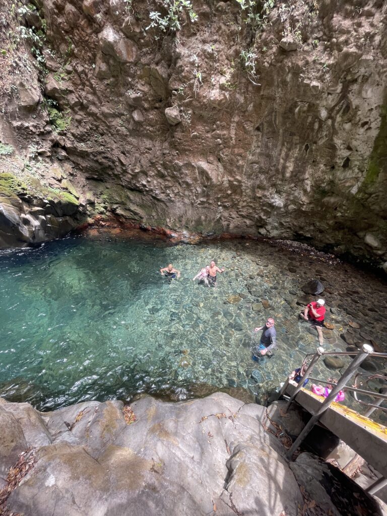 Wide curtain of water at Llanos de Cortés waterfall in Guanacaste, Costa Rica
