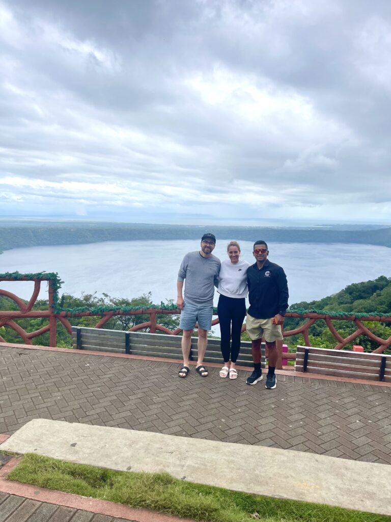 Travelers at the colorful Masaya Volcano sign in Nicaragua