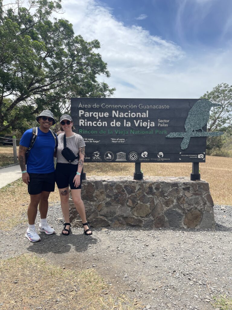 Guests photographing volcanic steam from a viewpoint at Rincón de la Vieja