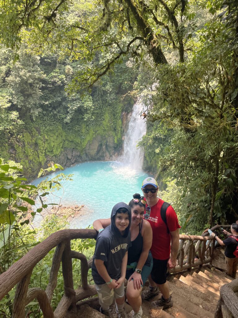 Río Celeste waterfall pouring into a sky-blue pool, Tenorio Volcano National Park